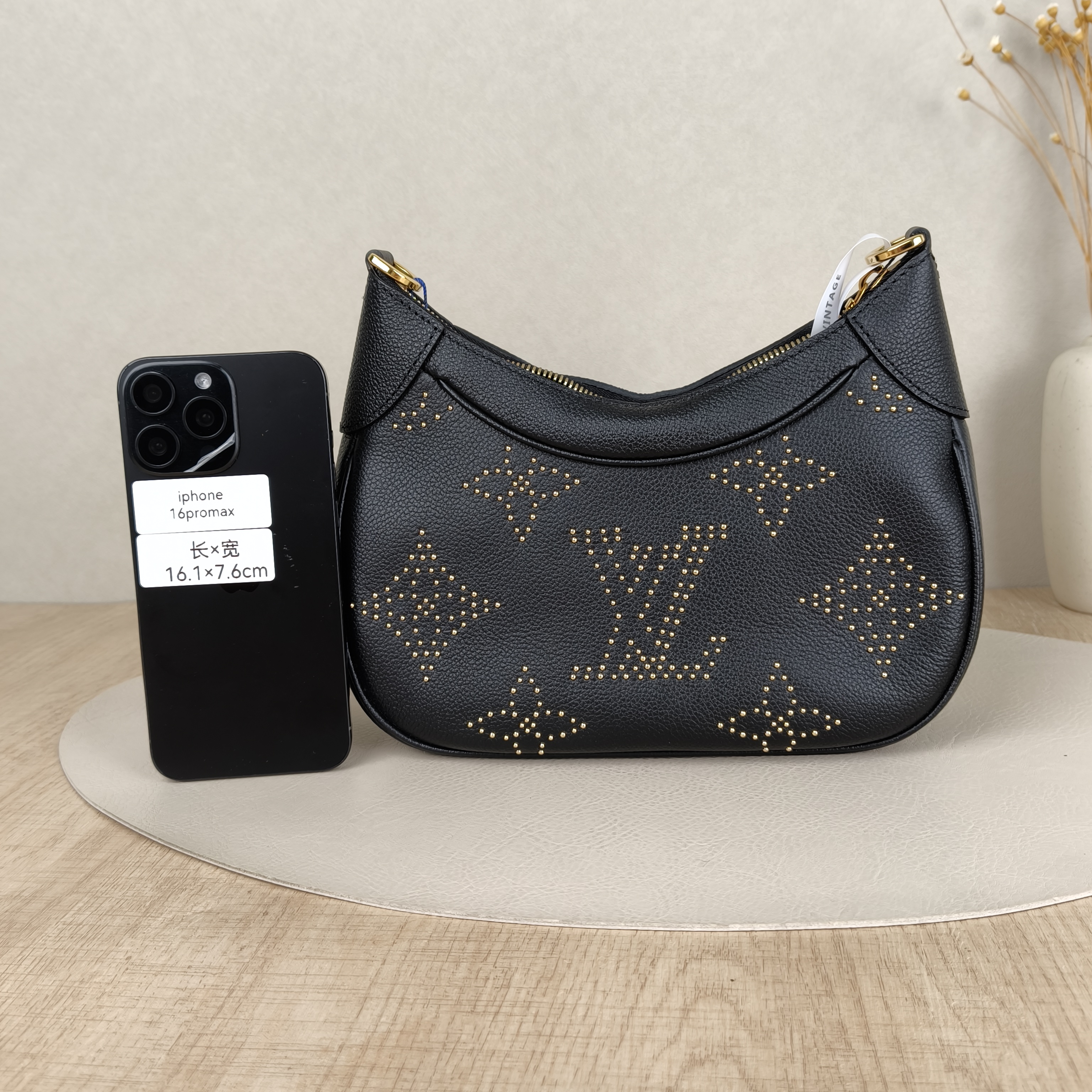 Louis Vuitton Shoulder Bag Bagatelle Black · Edition Empreinte Embossed Calfskin Monogram Small24 × 7 × 18 cm — cover view 4 of 5