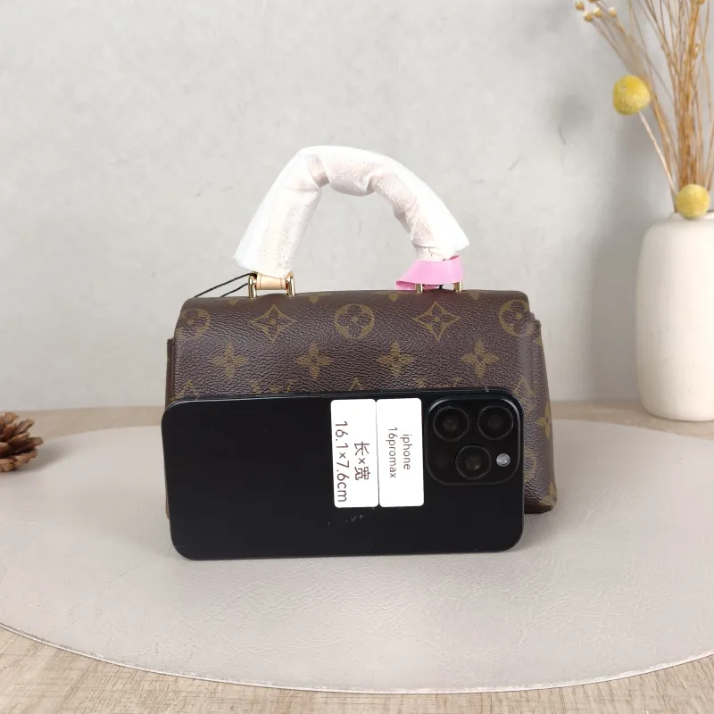 Louis Vuitton Crossbody Bag MADELEINE Monogram PVC nano 21 × 6 × 12.5 cm — cover view 4 of 5