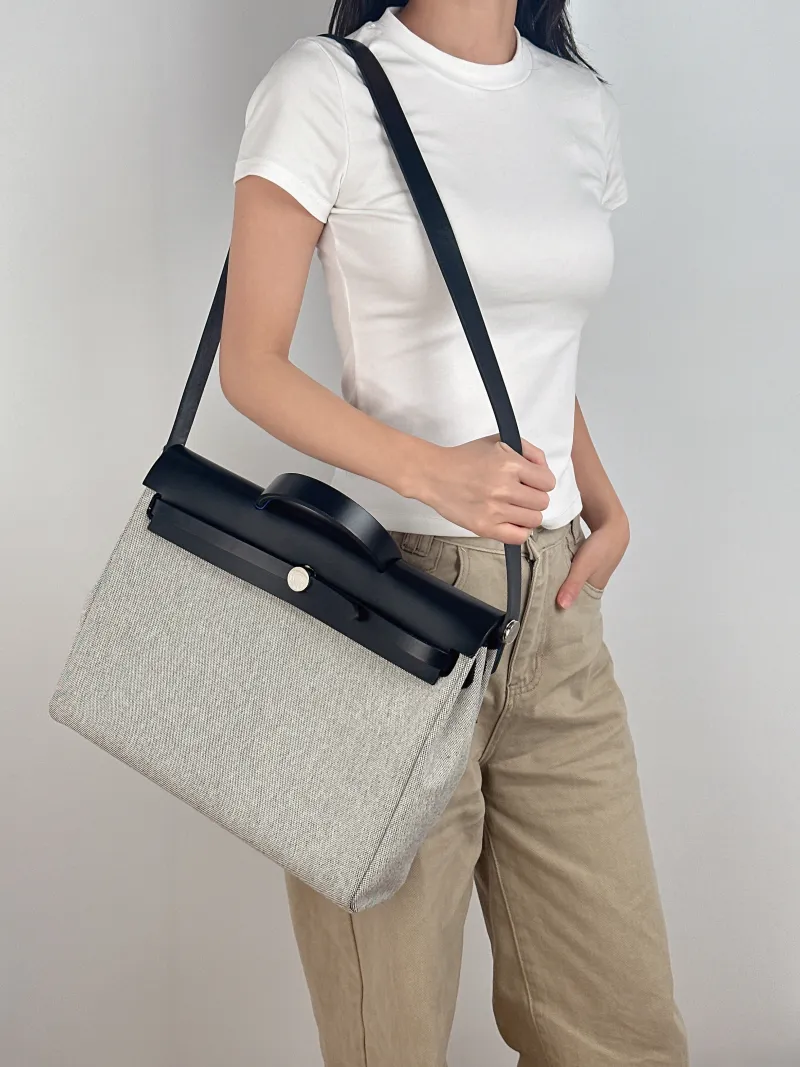 Hermès Top Handle Bag herbag messenger 39 Top Handle Bag Beige Black Canvas · Calfskin One Size 36 × 9 × 28 cm k — on-model view 3 of 3