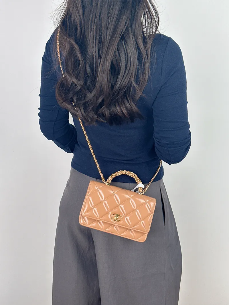 Chanel Crossbody Bag woc Brown Lambskin One Size19.2 × 3.5 × 12.3 cm — on-model view 1 of 2