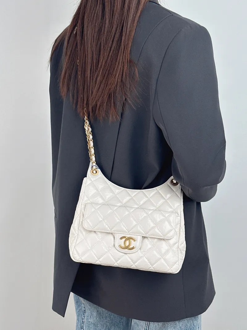 Chanel Crossbody Bag HOBO White Waxed Leather Medium 23 × 8 × 21 cm — on-model view 2 of 2
