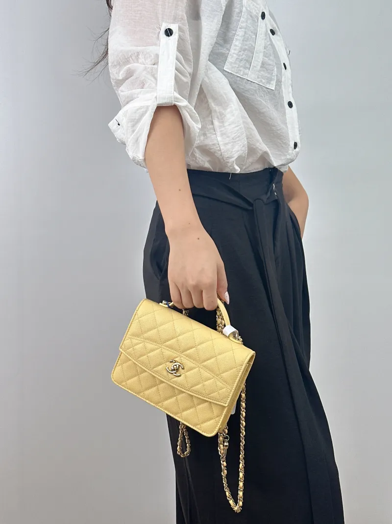 Chanel Backpack Yellow Grained Calfskin One Size 18.2 × 5 × 14 cm — on-model view 2 of 3