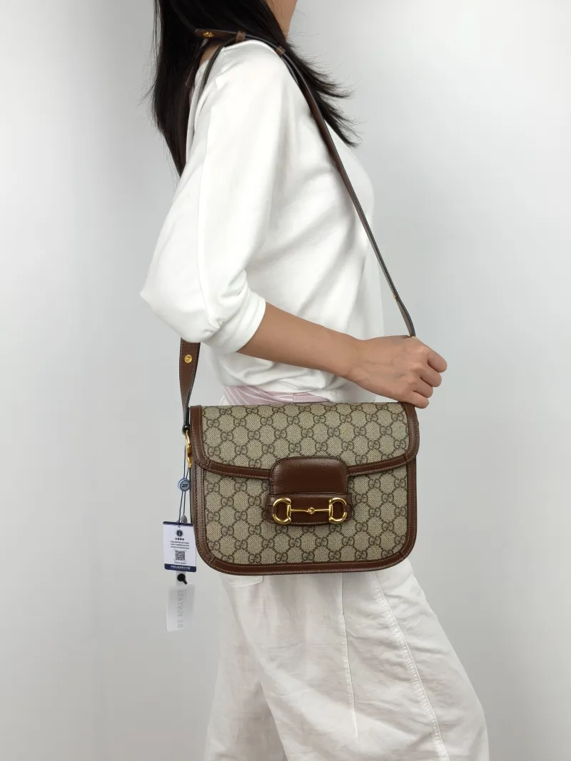 GUCCI Shoulder Bag Horsebit 1955 Horsebit Medium Monogram PVC Medium 25 × 8 × 18 cm — on-model view 1 of 3