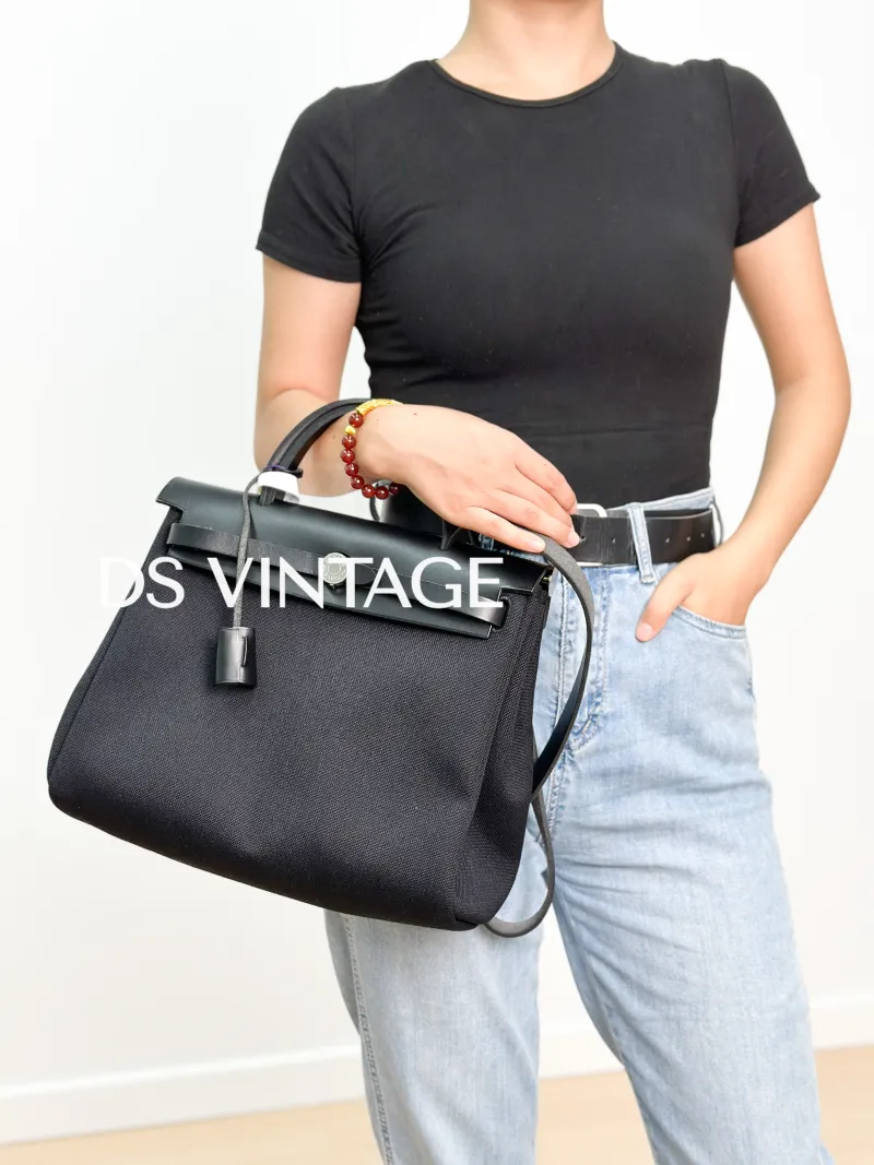 Hermès Shoulder Bag Herbag 31Black Canvas Canvas Berliner Medium31 × 10 × 25 cm — on-model view 3 of 4