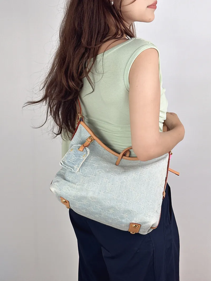 Louis Vuitton Crossbody Bag Carryall Blue Small29 × 12 × 24 cm — on-model view 1 of 2