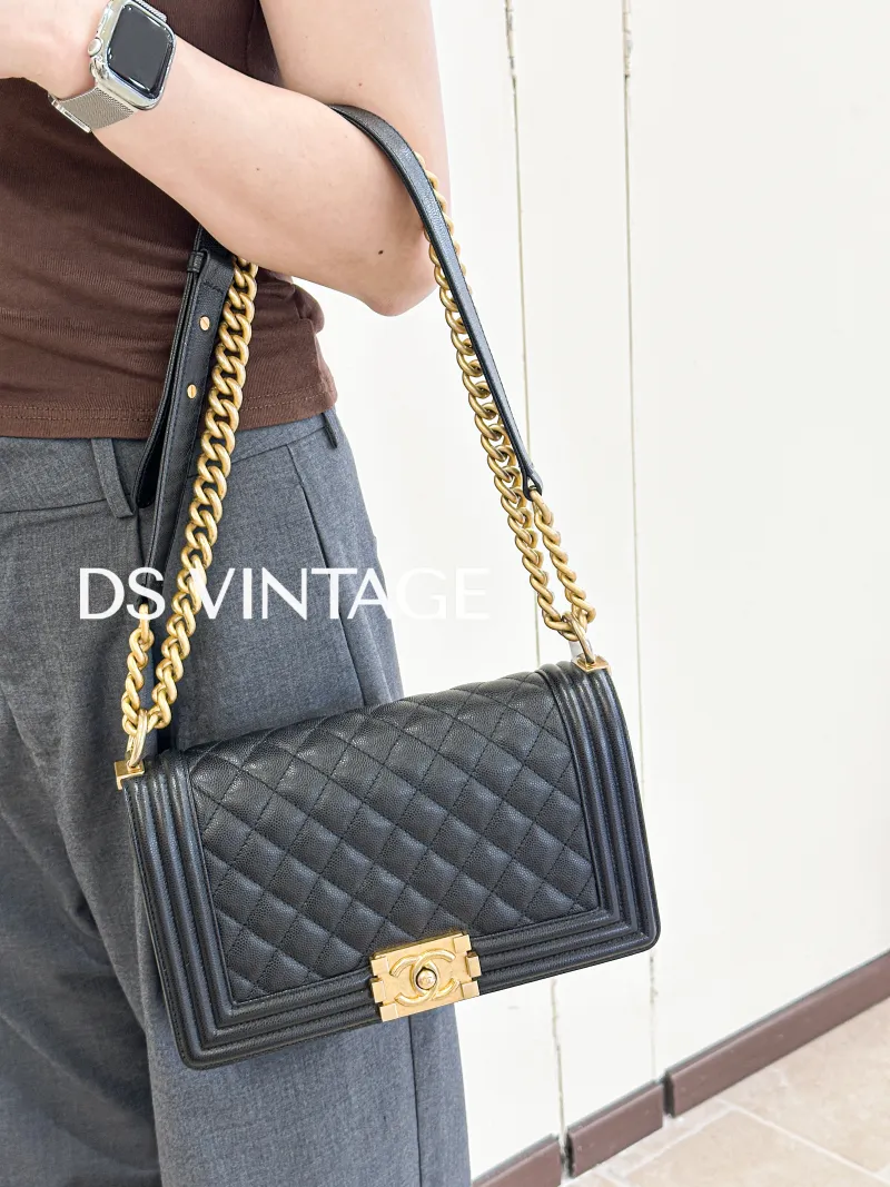 Chanel Crossbody Bag Le Boy​ Black Grained Calfskin Medium 25 × 9 × 15 cm 26 — on-model view 1 of 3