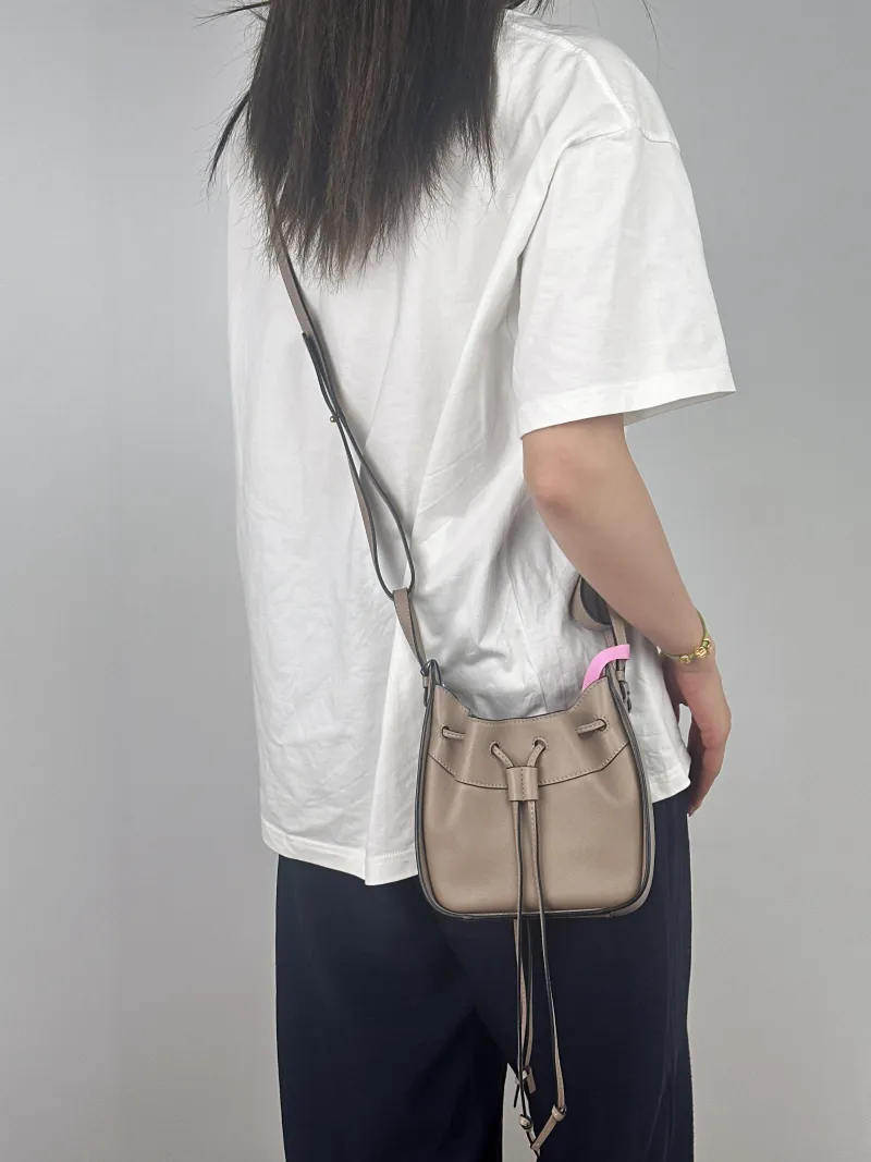 LOEWE Crossbody Bag Hammock Calfskinmini17 × 11 × 19.5 cm — on-model view 1 of 2