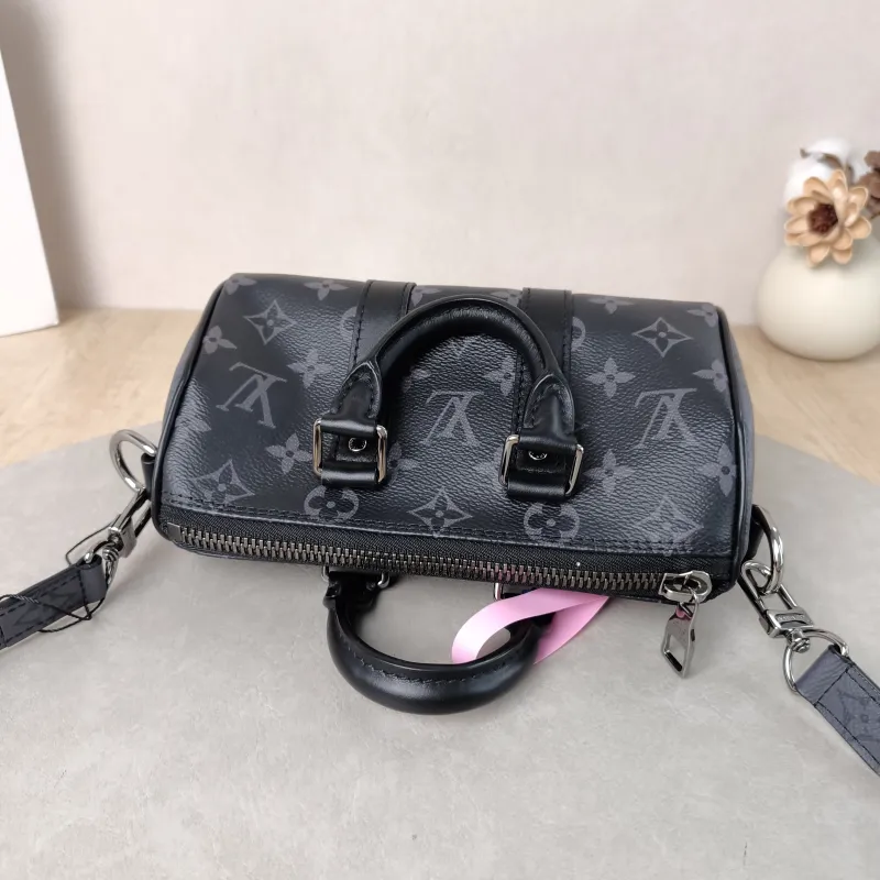 Louis Vuitton Crossbody Bag Keepall XS Monogram PVC Mini 21 × 9 × 12 cm — detail view 7 of 10