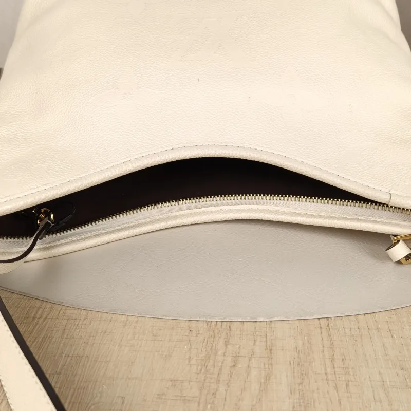 Louis Vuitton carryall Small White Calfskin Microchip Edition · Shoulder Strap Inner Pouch Leather Tag · 29.5 × 12 × 24 cm — detail view 2 of 11