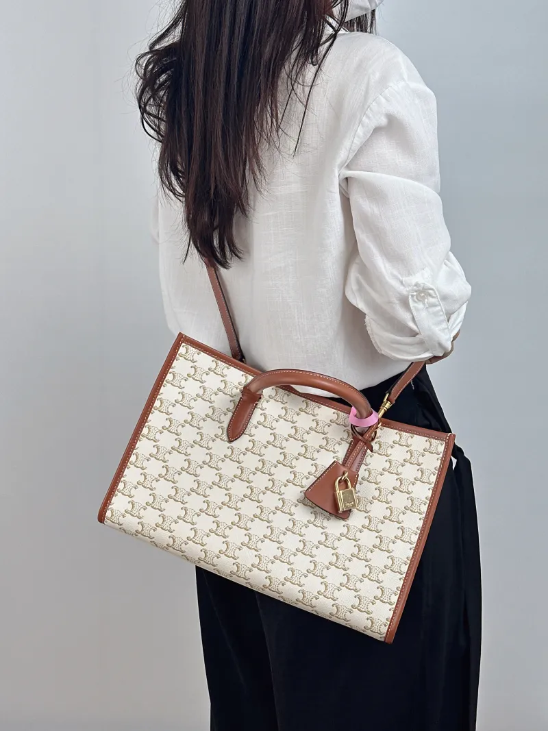CELINE Top Handle Bag Horizontal Cabas Shopping Tote Beige PVC Mini 34 × 12 × 22.5 cm — on-model view 1 of 2