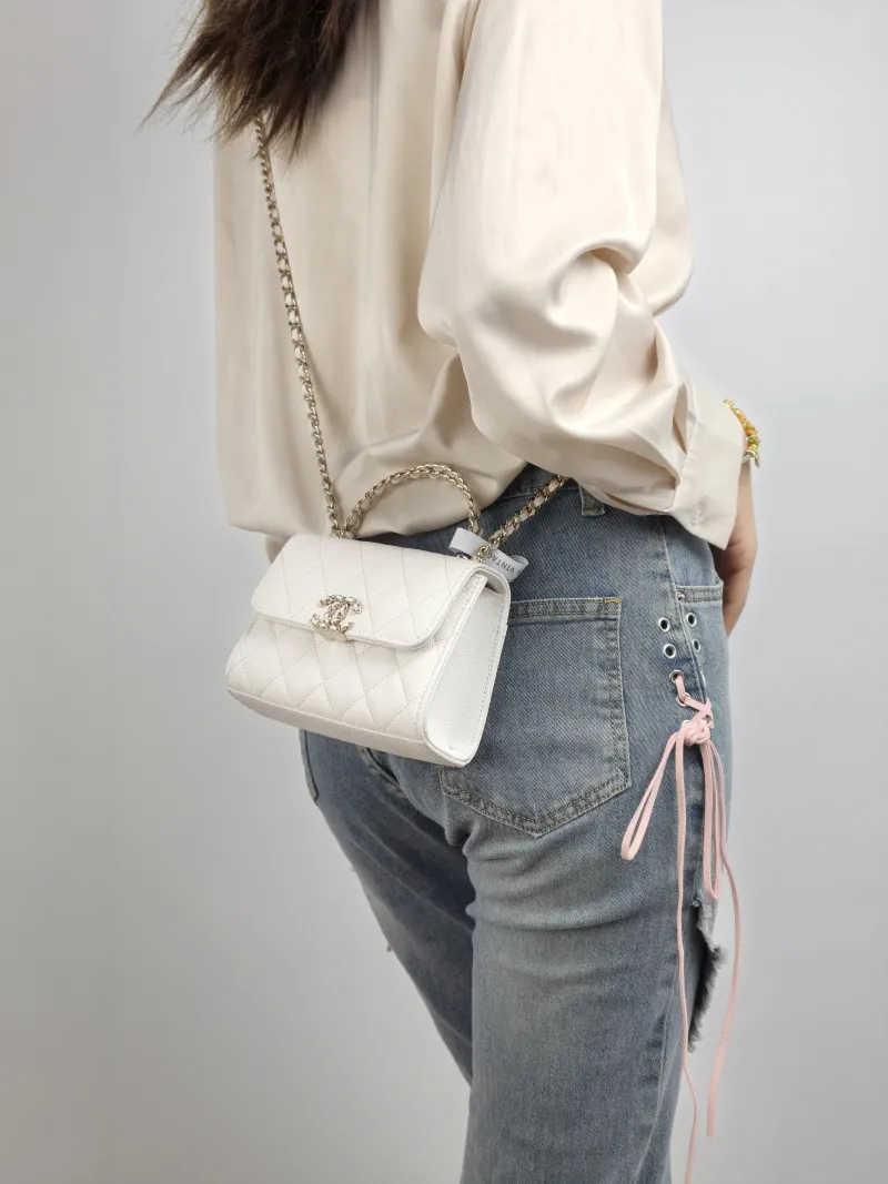 Chanel Crossbody Bag kelly White Gold Grained Calfskin nano 15 × 5 × 11 cm — on-model view 1 of 2