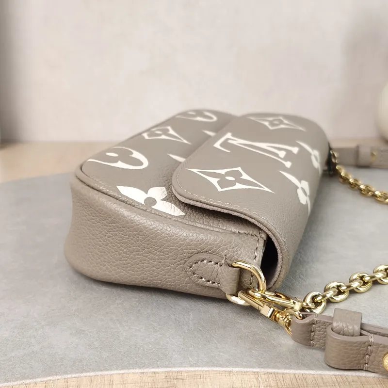 Louis Vuitton Crossbody Bag IVY Empreinte Embossed Calfskin Small 23.5 × 4.3 × 12 cm — detail view 6 of 11