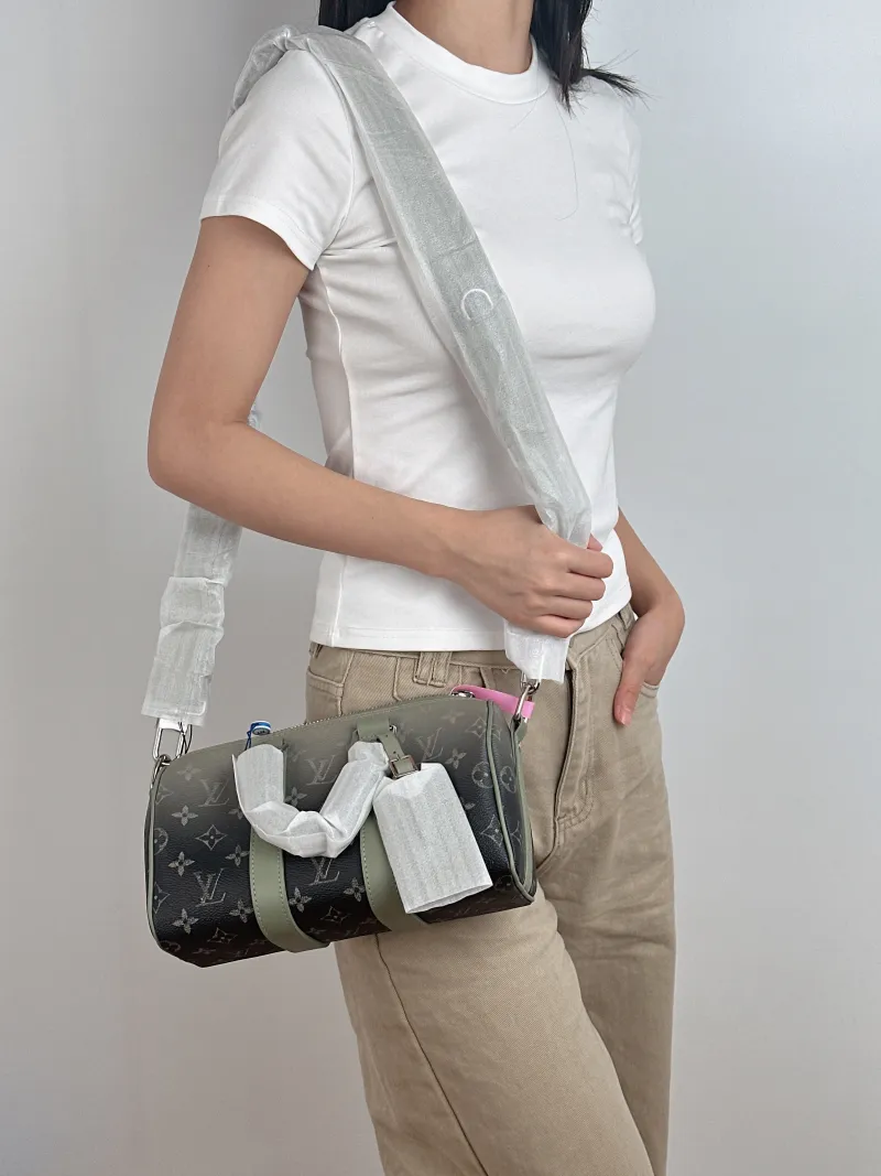 Louis Vuitton Crossbody Bag Keepall 25 PVC Medium 25 × 11 × 15 cm — on-model view 3 of 3