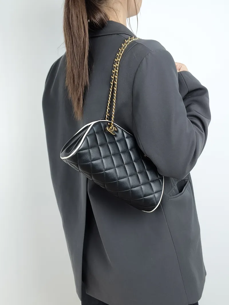 Chanel Crossbody Bag Bowling Bag Black Lambskin One Size 25 × 8 × 14 cm — on-model view 1 of 2