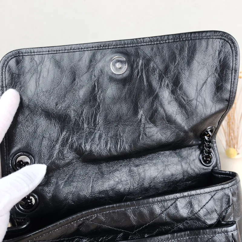 SAINT LAURENT Crossbody Bag Niki Black Waxed Leather Calfskin Medium 28 × 8.5 × 20 cm — detail view 13 of 14