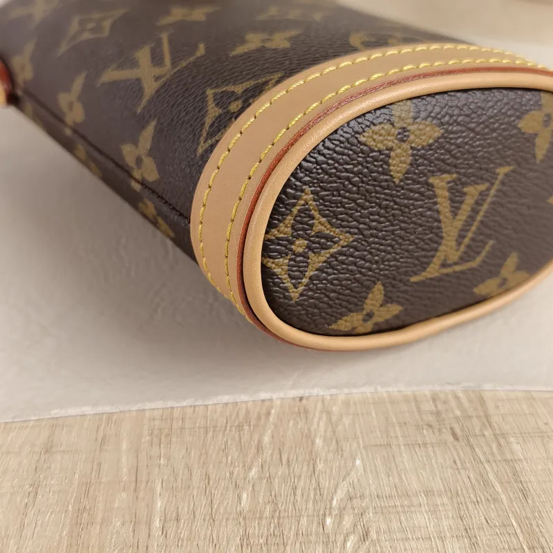 Louis Vuitton Crossbody Bag Fold Me Monogram PVC Mini 14.5 × 6.5 × 18 cm — detail view 2 of 10