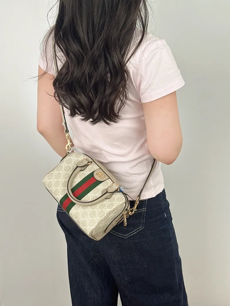 GUCCI Top Handle Bag Ophidia Beige PVC Mini 21.5 × 11.5 × 14 cm — on-model view 1 of 2