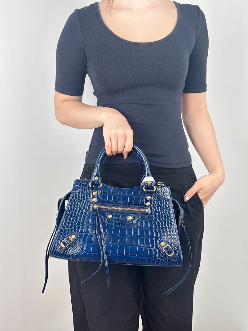 BALENCIAGA Crossbody Bag Neo Classic Blue Calfskin Small 33 × 15.5 × 21 cm — on-model view 2 of 3