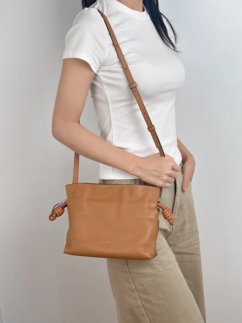 LOEWE Crossbody Bag Flamenco Brown Calfskin Mini 24 × 9 × 18 cm — on-model view 1 of 2