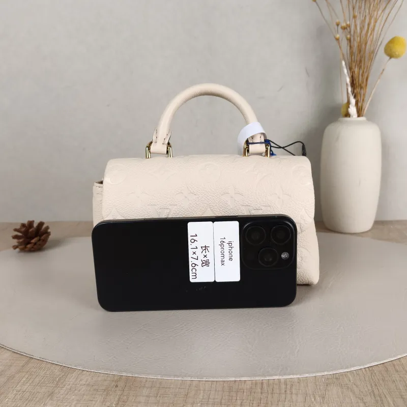 Louis Vuitton Crossbody Bag MADELEINE White Empreinte Embossed Calfskinnano21 × 6 × 12.5 cm — cover view 3 of 6