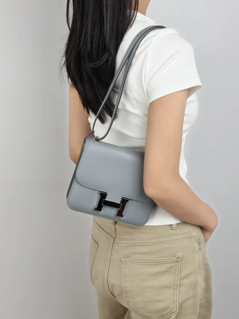 Hermès Crossbody Bag Constance 19 Silver-Tone Hardware Swift Calfskin Mini 19 × 4 × 15 cm K — on-model view 2 of 3