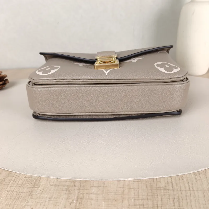 Louis Vuitton Crossbody Bag Pochette Métis East West Empreinte Embossed Calfskin Monogram Small21.5 × 6 × 13.5 cm — cover view 5 of 5