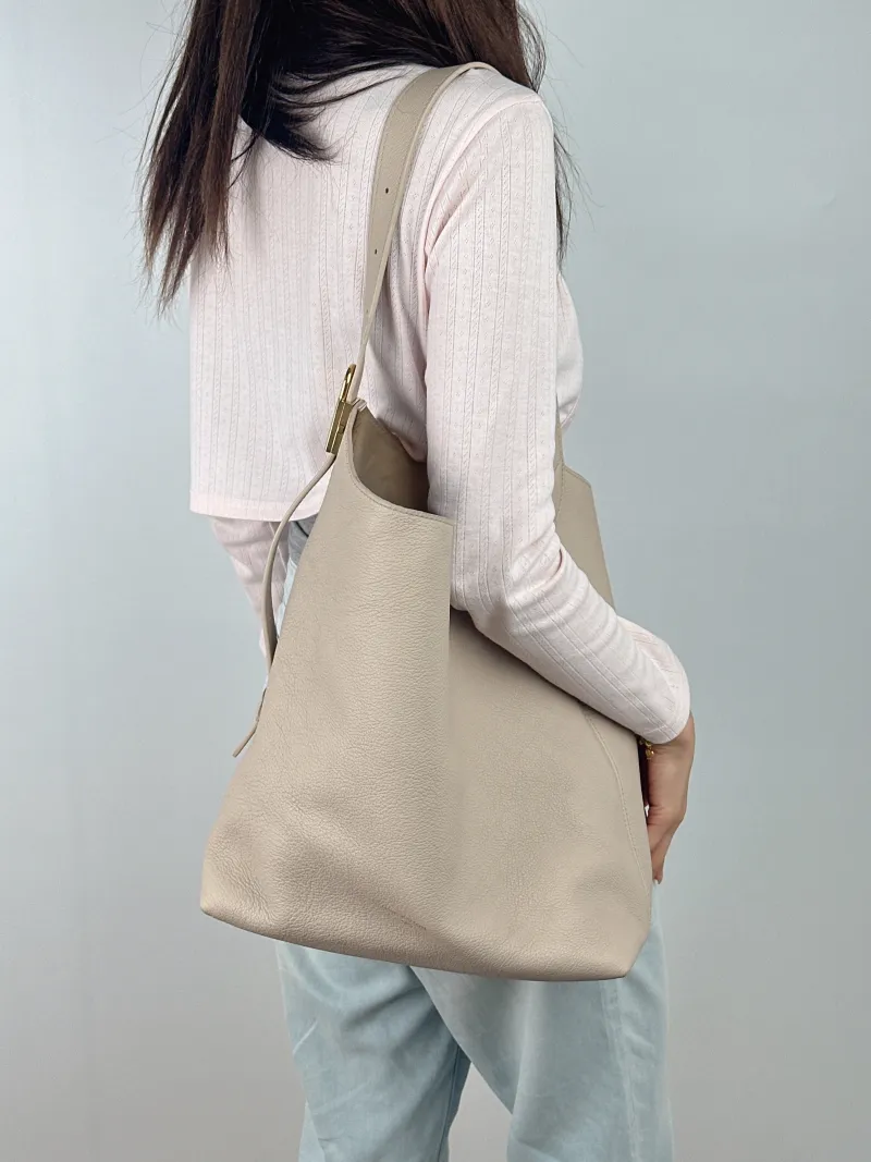 Louis Vuitton Shoulder Bag Low Key Hobo Shoulder Bag White Calfskin Medium 31 × 18 × 35 cm — on-model view 2 of 2