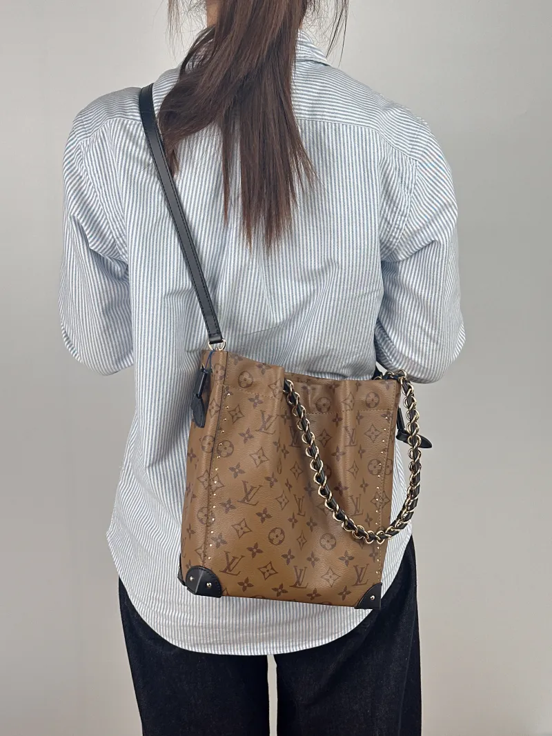 Louis Vuitton Shoulder Bag NOÉ TRUNK Monogram PVC Small 23 × 8 × 27 cm — on-model view 2 of 2