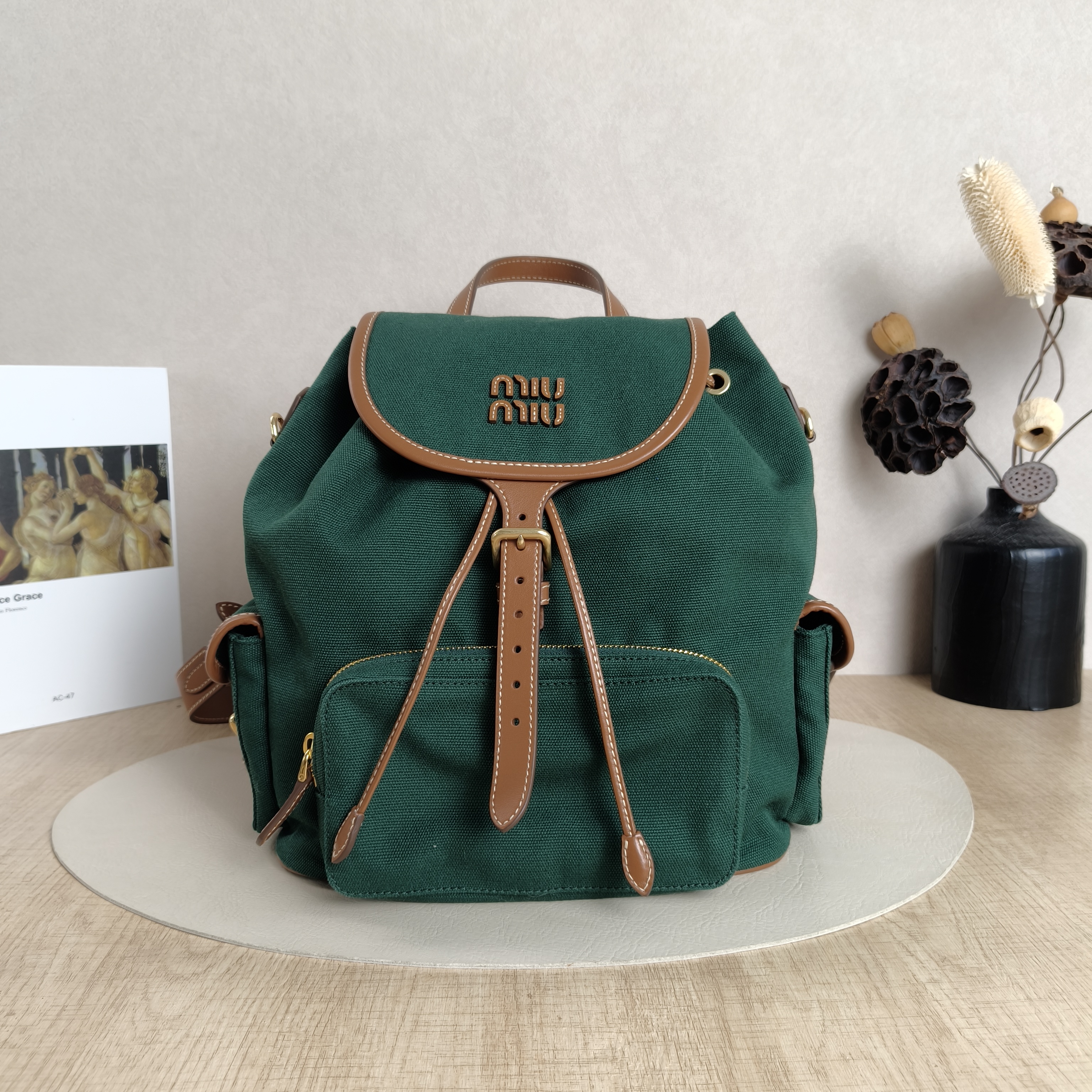 Miumiu Backpack Backpack Green Canvas Large25 × 14 × 25 cm