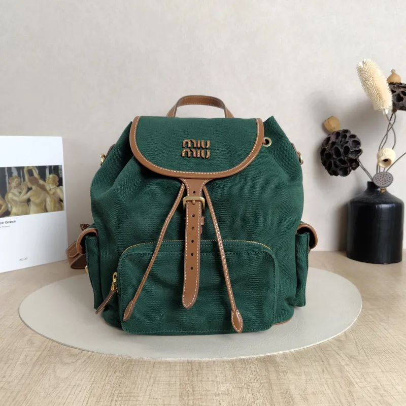 Miumiu Backpack Backpack Green Canvas Large25 × 14 × 25 cm