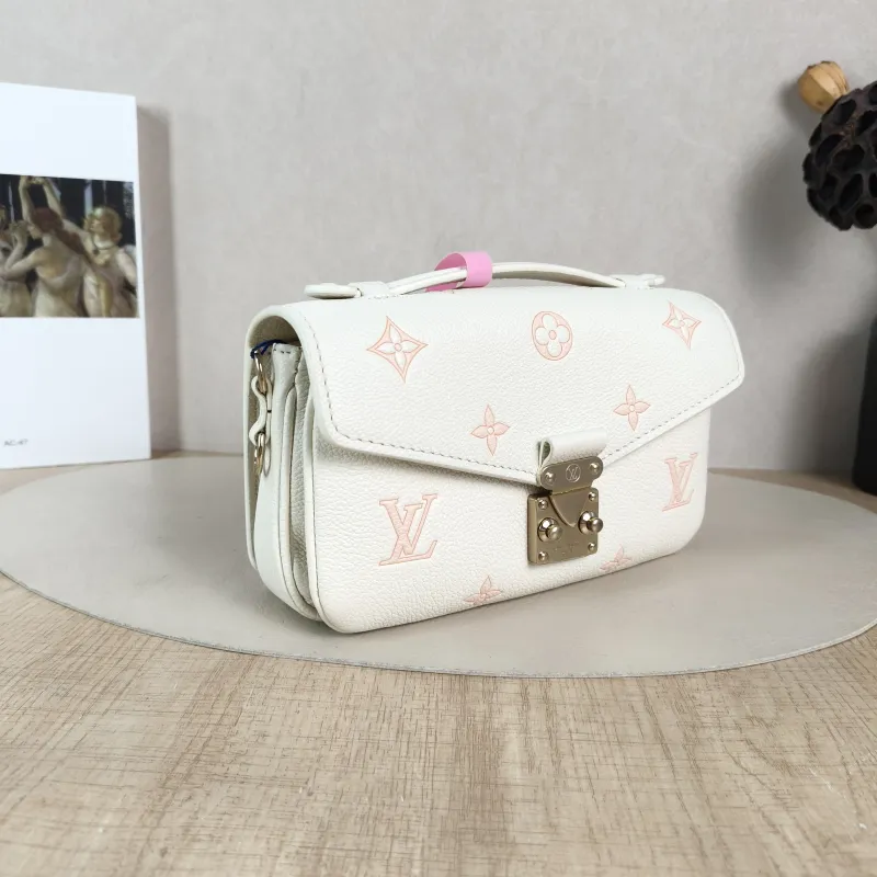 Louis Vuitton Crossbody Bag Pochette Métis East West White · Pink Monogram Empreinte Embossed Calfskin Small 21.5 × 6 × 13.5 cm — cover view 5 of 5