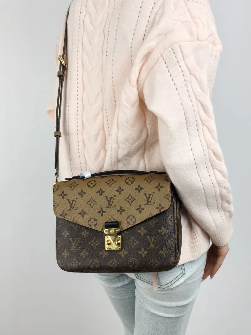 Louis Vuitton Crossbody Bag Pochette Métis Monogram Colorblock PVC Medium 25 × 7 × 19 cm — on-model view 1 of 2