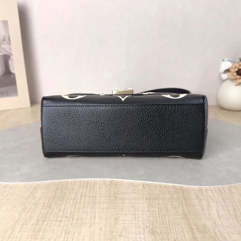 Louis Vuitton Crossbody Bag MADELEINE Black · White Monogram Empreinte Embossed Calfskin BB 24 × 8.5 × 17 cm — cover view 6 of 6