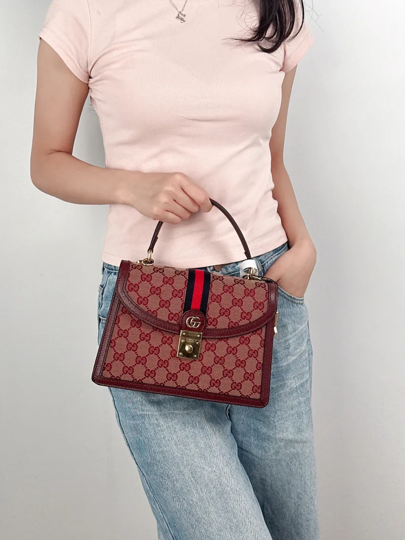 GUCCI Crossbody Bag Ophidia GG Messenger Bag Burgundy Canvas Medium25 × 7 × 17.5 cm — on-model view 1 of 3
