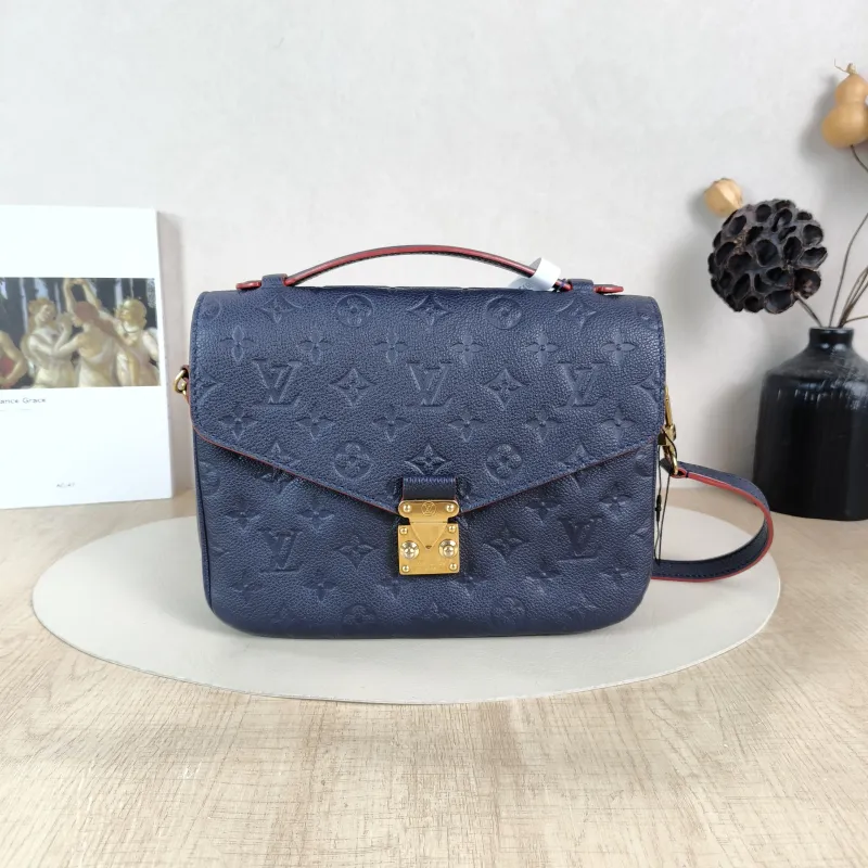 Louis Vuitton Crossbody Bag Pochette Métis · Monogram Empreinte Embossed Calfskin Medium 25 × 7 × 19 cm