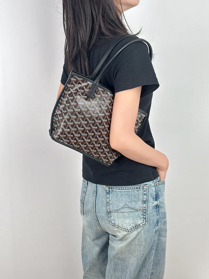 GOYARD Top Handle Bag ANJOU Shopping Tote Black ine Canvas Mini 19.5 × 9 × 19.5 cm — on-model view 2 of 3