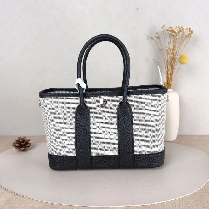 Hermès Top Handle Bag Neo Garden 23 Mini Black · Beige Canvas · Negonda Calfskinmini23 × 10 × 16 cm — cover view 3 of 6