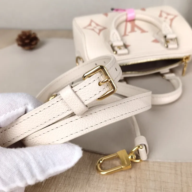 Louis Vuitton Crossbody Bag Speedy Nano White · Pink Empreinte Embossed Calfskin nano 16 × 7.5 × 10 cm — detail view 7 of 10