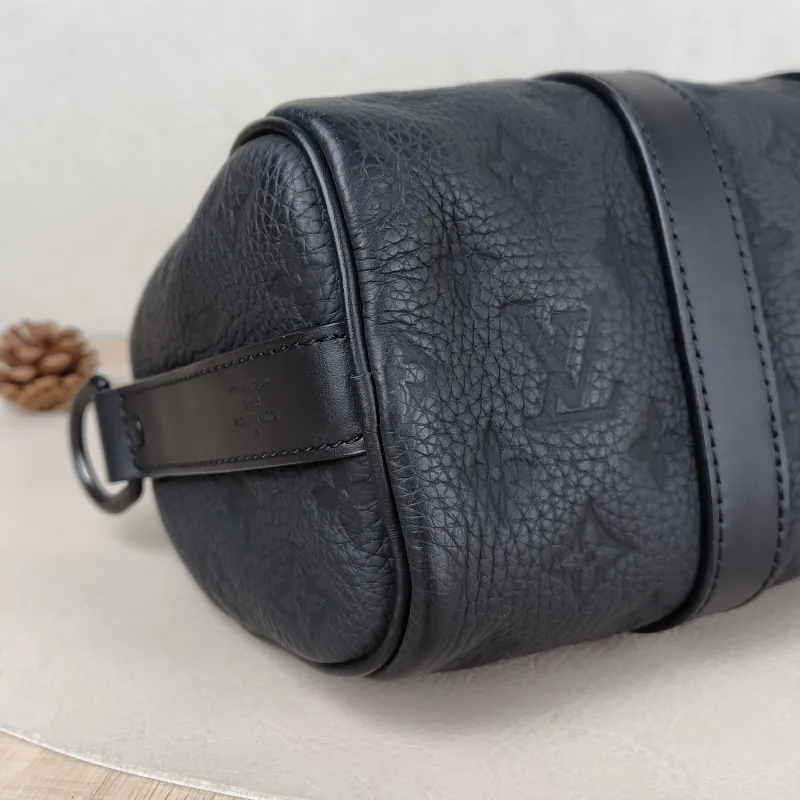 Louis Vuitton Crossbody Bag Keepall 25 Taurillon Monogram Embossed Calfskin Medium 25 × 11 × 15 cm — detail view 5 of 11