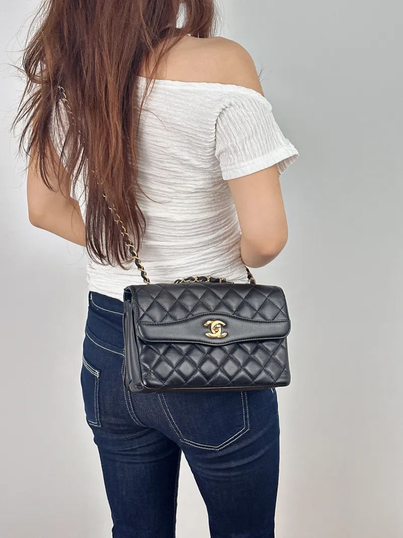 Chanel Crossbody Bag Crossbody Bag Black with Gold-Tone Hardware Lambskin One Size 24 × 7 × 15 cm 24 — on-model view 2 of 2