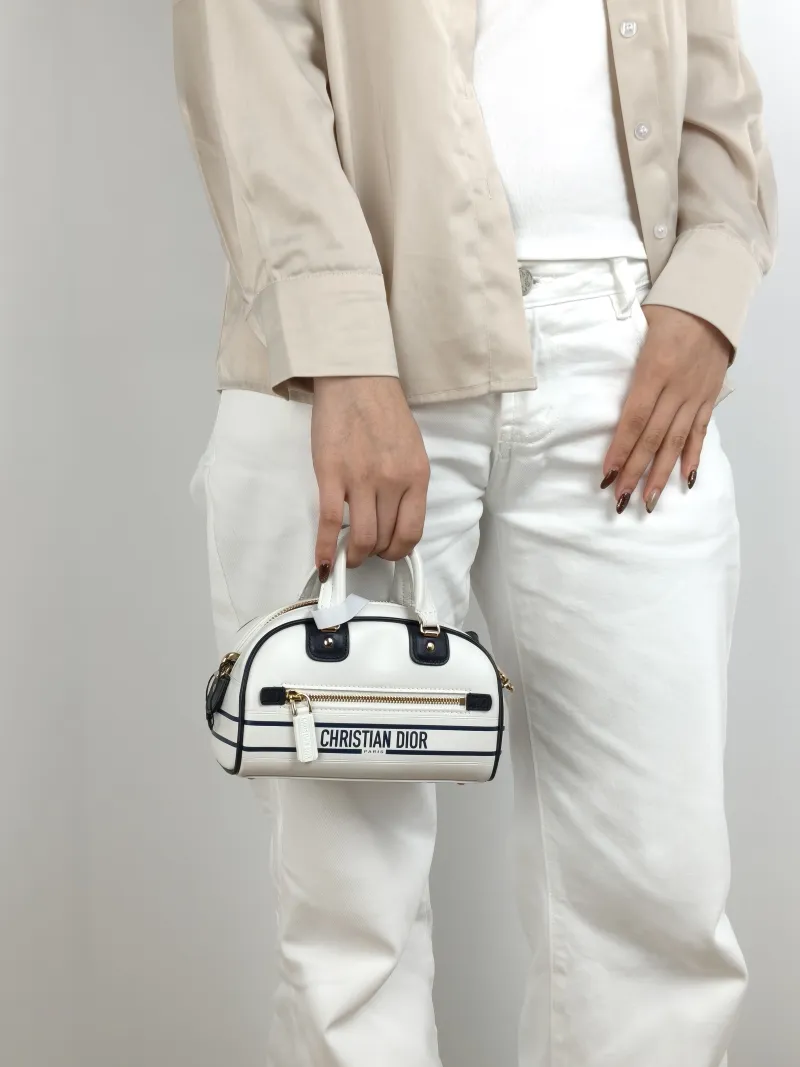 DIOR Crossbody Bag Vibe Bowling White CC alfskin Mini 17.5 × 8 × 10.5 cm — on-model view 1 of 3
