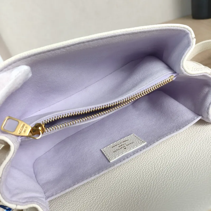 Louis Vuitton Crossbody Bag Pochette Métis East West White · Monogram Empreinte Embossed Calfskin Small 21.5 × 6 × 13.5 cm — detail view 3 of 11