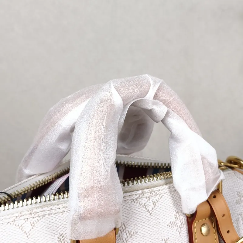 Louis Vuitton Crossbody Bag Keepall 25 White Monogram PVC Medium 25 × 11 × 15 cm — detail view 2 of 10