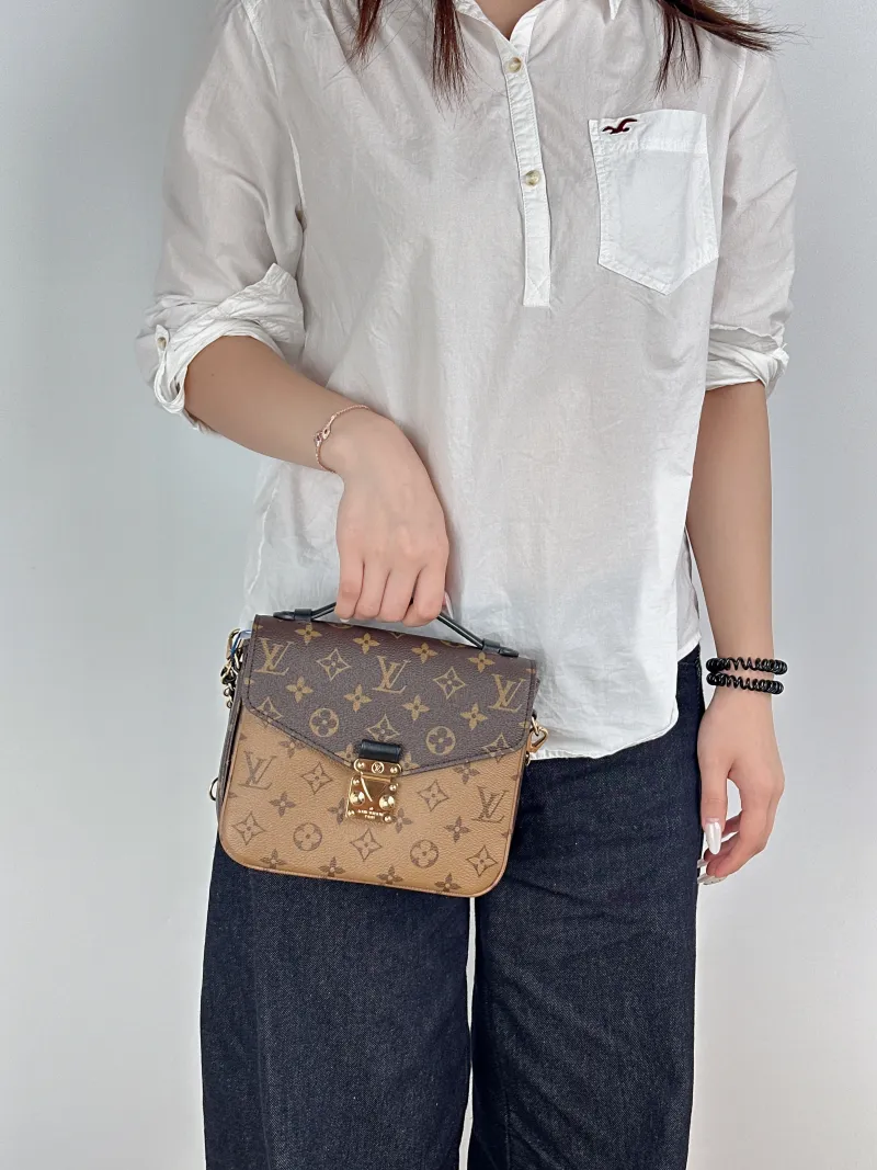 Louis Vuitton Backpack Pochette Métis Backpack Monogram PVC One Size20 × 7 × 17 cm — on-model view 1 of 2