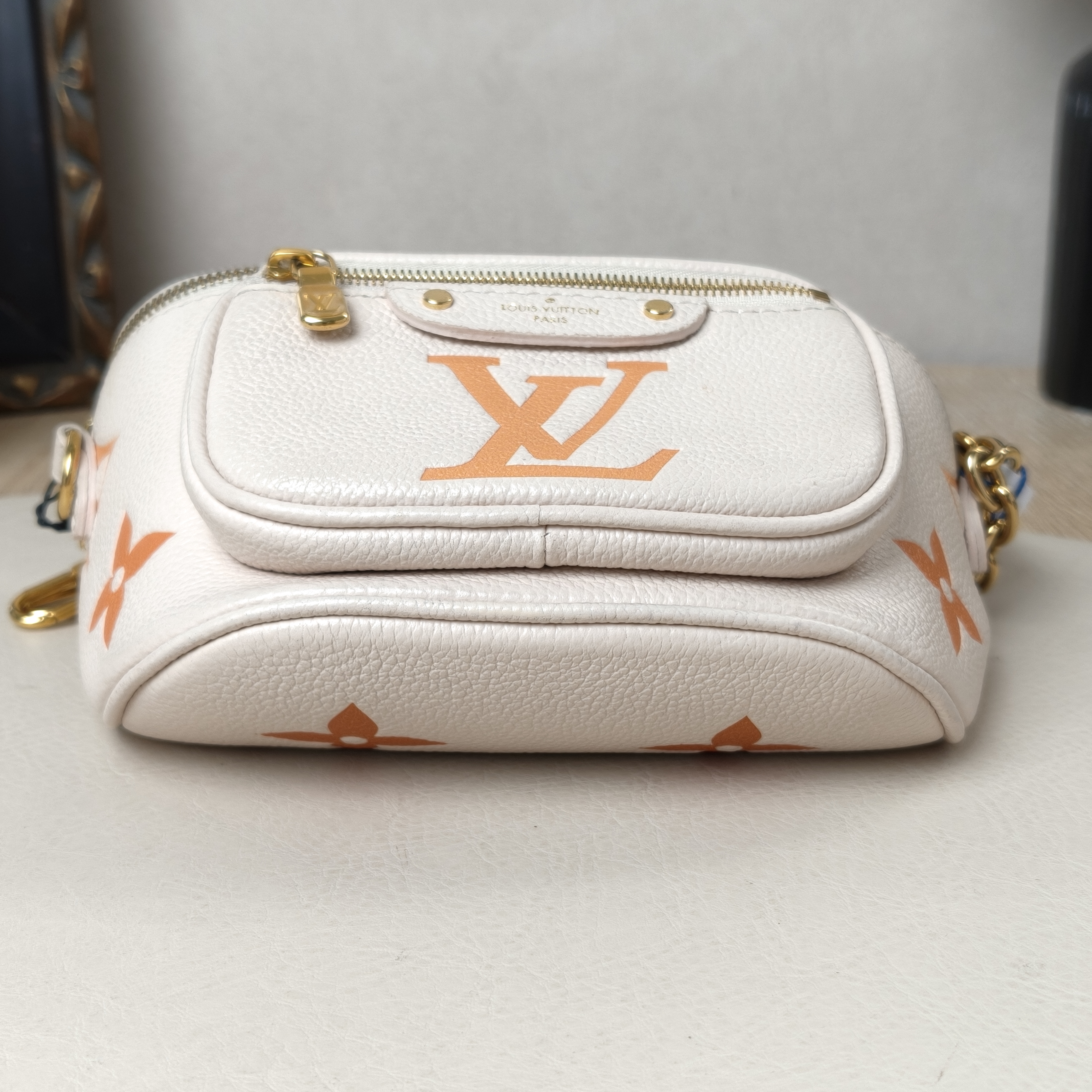 Louis Vuitton Belt Bag mini Beige Calfskin Microchip Edition · Two Straps · 17 × 9.5 × 12 cm — cover view 7 of 9