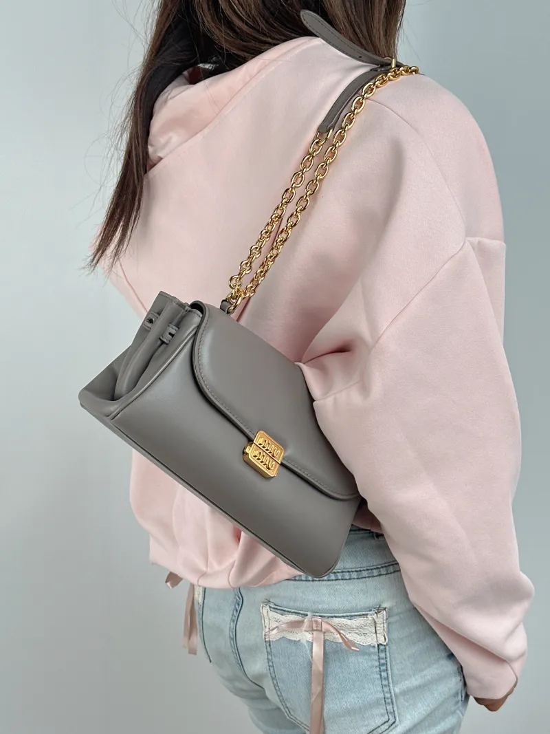 Miumiu Shoulder Bag Grey Calfskin One Size 26 × 9.5 × 14.5 cm — on-model view 1 of 2