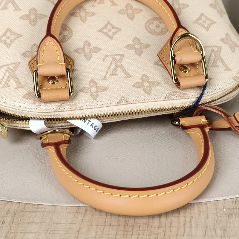 Louis Vuitton Top Handle Bag Alma BB PVCBB23.5 × 11.5 × 17.5 cm — detail view 6 of 12