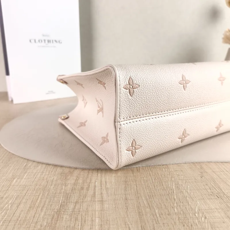Louis Vuitton Shoulder Bag Onthego Beige · Pink Empreinte Embossed Calfskin Small 25 × 11.5 × 19 cm — detail view 4 of 12