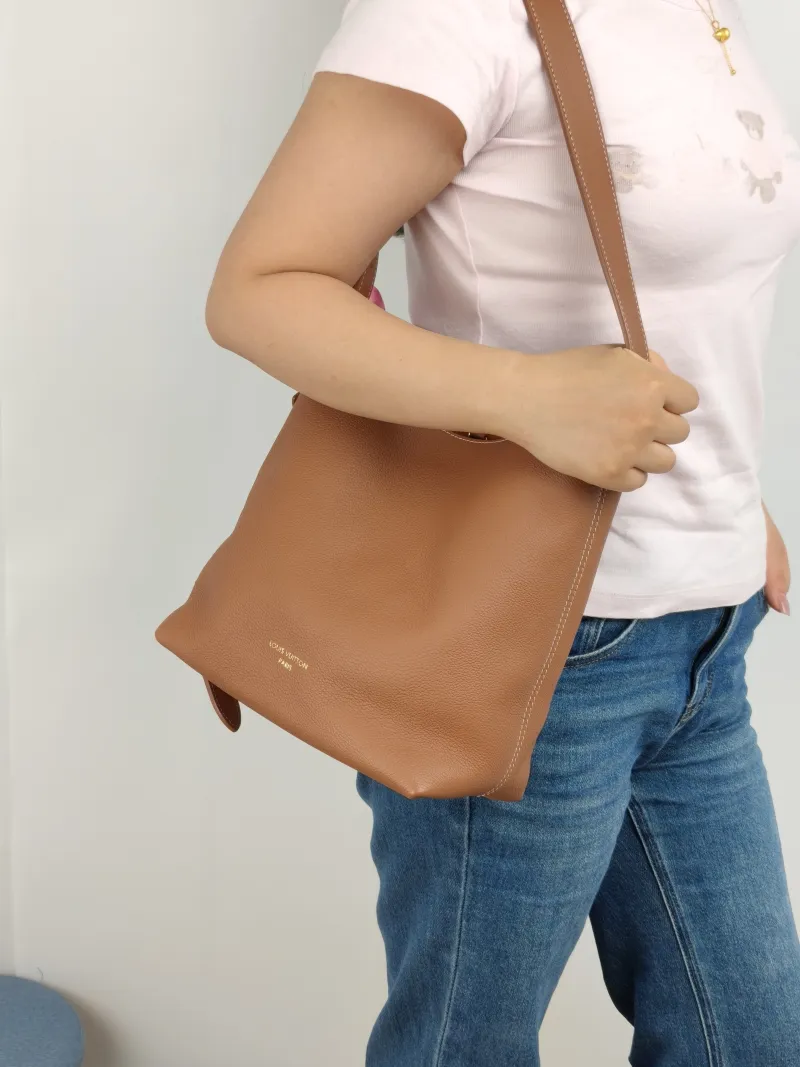 Louis Vuitton Shoulder Bag Low Key Hobo Shoulder Bag Calfskin Small 24 × 16 × 28 cm — on-model view 2 of 2