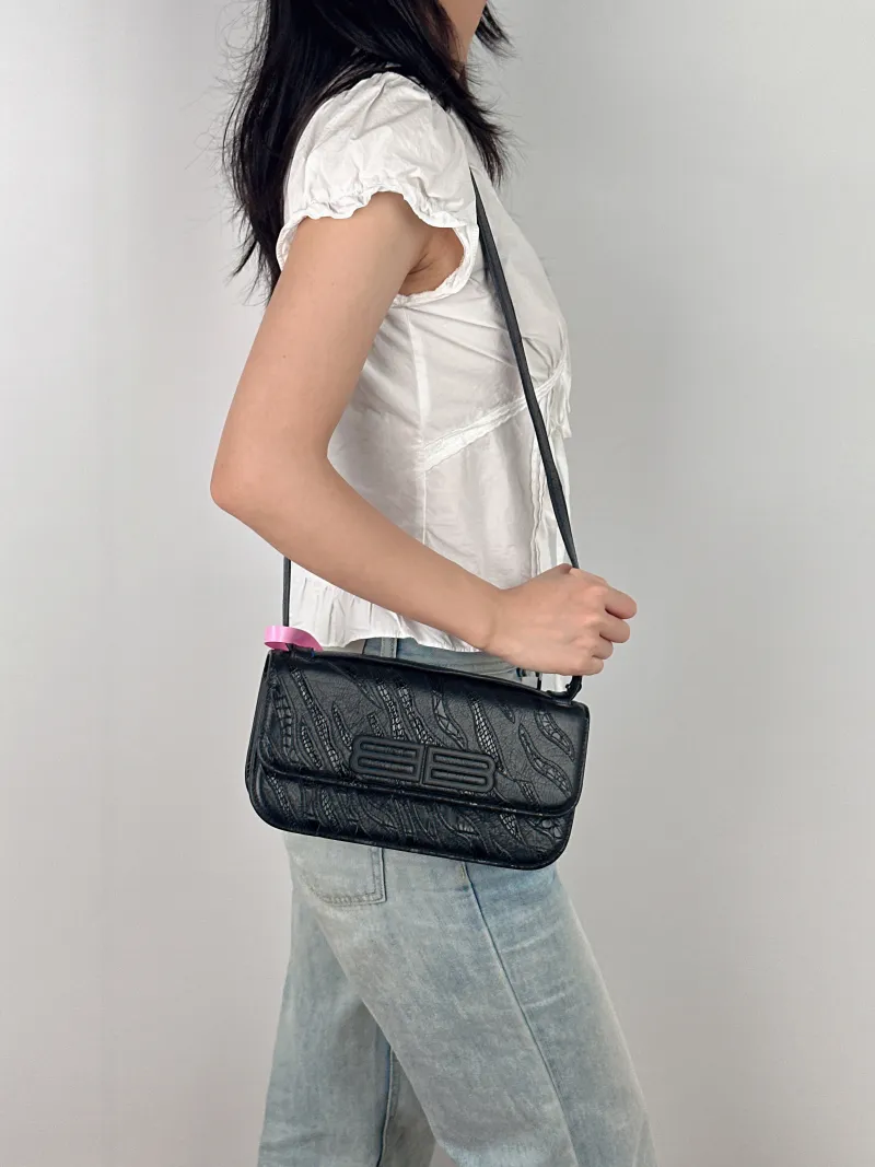 BALENCIAGA Shoulder Bag GOSSIP Black CC alfskin Small 23.5 × 10.5 × 12.5 cm — on-model view 3 of 3